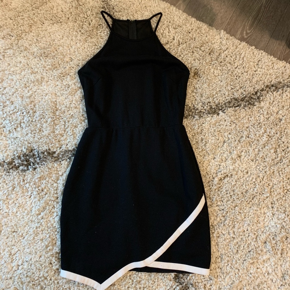 black bodycon dress with a feux front flap